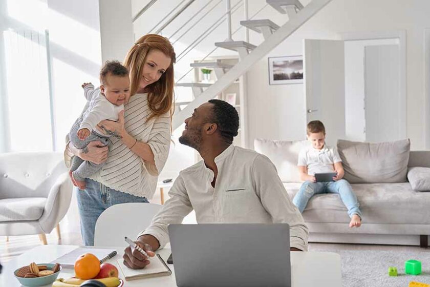 A family uses a Jeanne D'Arc Credit Union Statement Savings Account to save for the future.