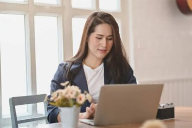 Woman in front of her laptop