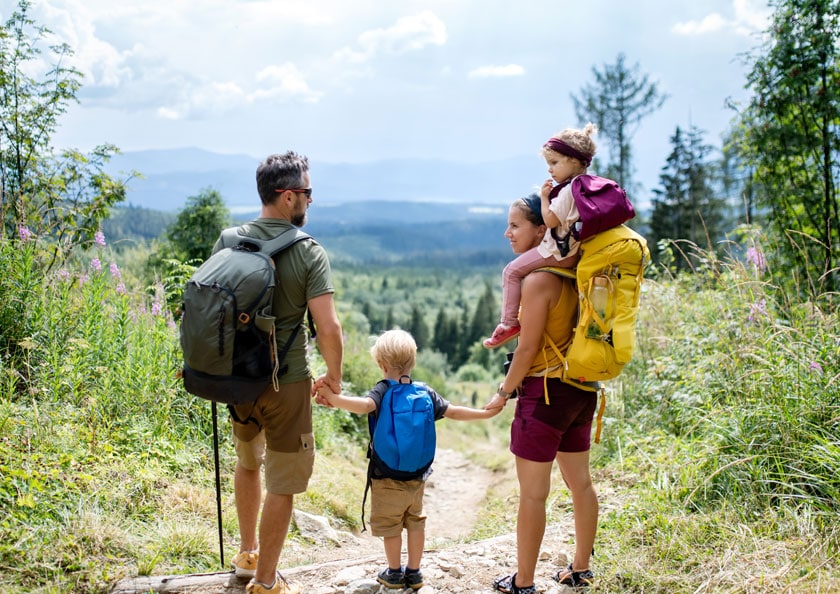 Happy family hiking
