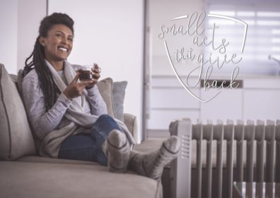 A woman drinking coffee in her home