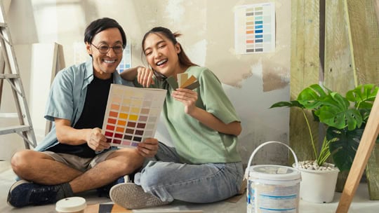 asian lover marry couple sit relax choosing new colour after test paint new colour new apartment home relocation moving in new house,Asia husband wife sit using laptop searching ideas for home decorating sit on floor daytime