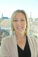 Headshot of Brandy Siegler, a white woman with blonde hair to her collarbone.