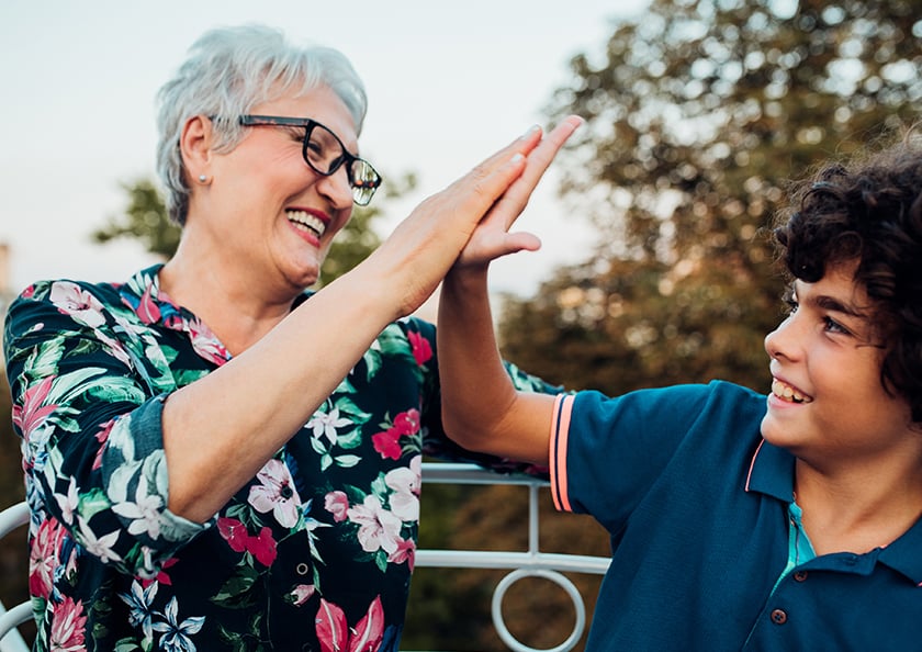 grandmother-celebrating-with-grandson-hero