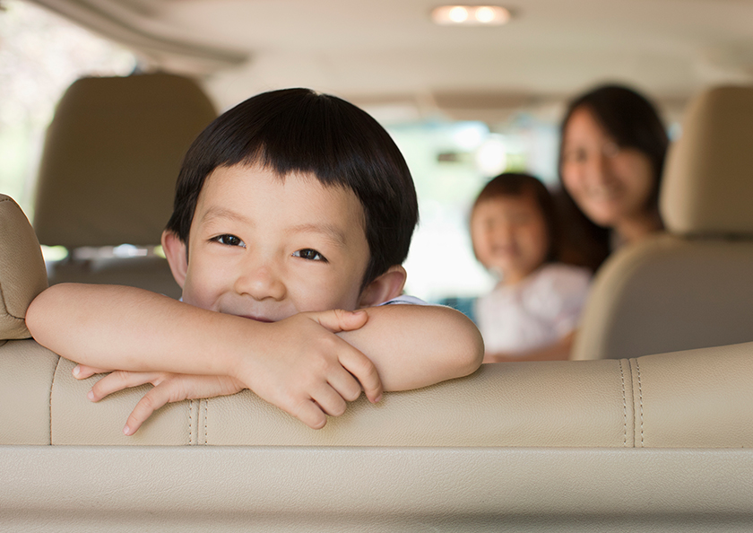 happy-family-in-car-hero