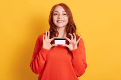 Girl holding a credit card