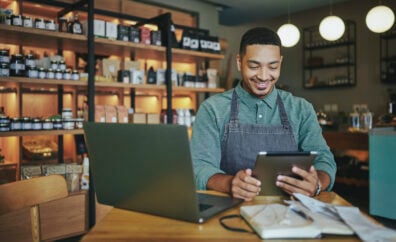 Small Business Owner looking at iPad