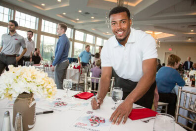New England cornerback Marcus Jones signs his autograph for event attendees of “An Exclusive Evening with Marcus Jones – Tackling Financial Wellness” at Four Oaks Country Club in Dracut, Massachusetts, on Thursday, May 7, 2026.