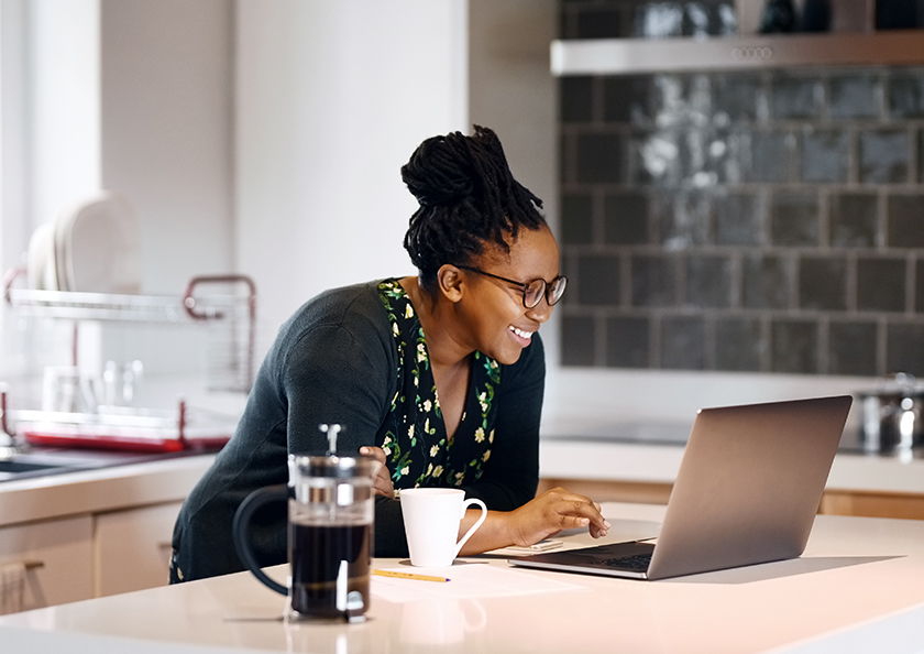 woman-applying-for-loan-on-laptop-hero